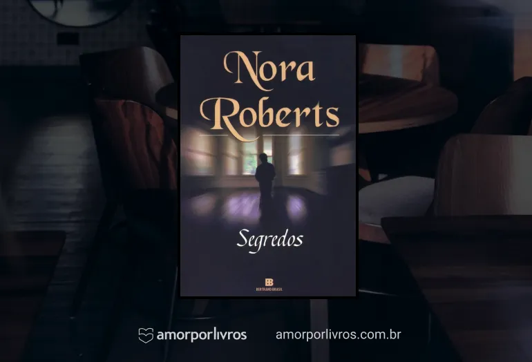 Capa do livro Segredos de Nora Roberts com um fundo de uma foto com uma mesa e cadeiras